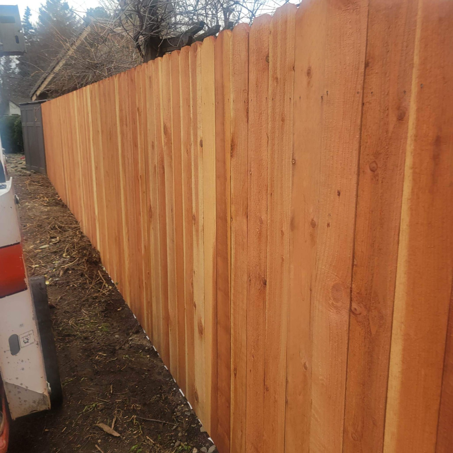 Redwood fence installation